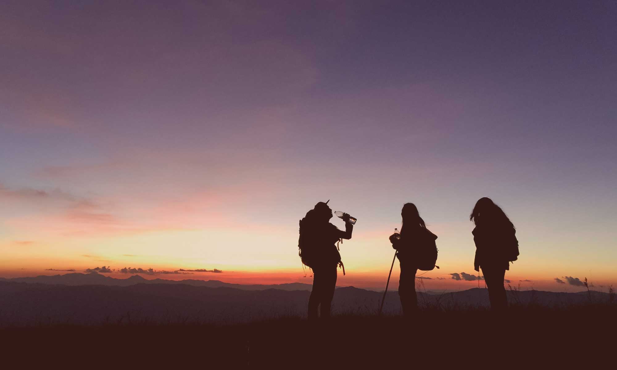 Tourists in the top of a mountain