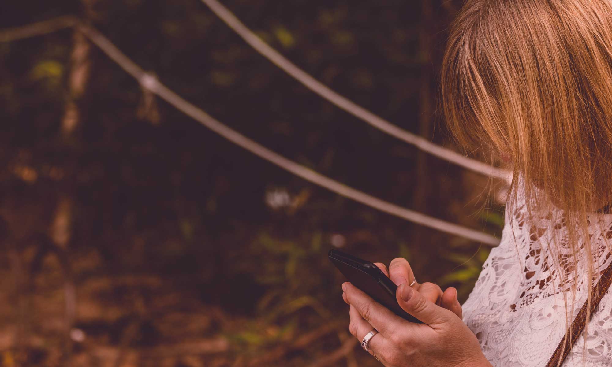 Tourist using a mobile phone